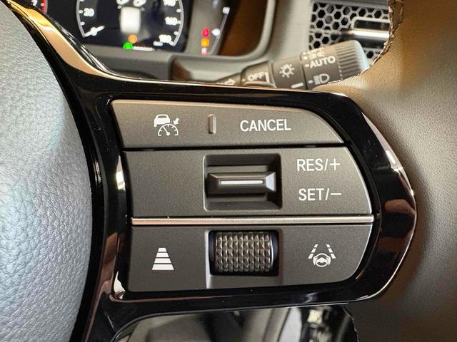 ステップワゴン スパーダ クリアランスソナー オートクルーズコントロール レーンアシスト 両側電動スライドドア オートライト 電動リアゲート スマートキー 電動格納ミラー シートヒーター 3列シート ウォークスルー オットマン(53枚目)