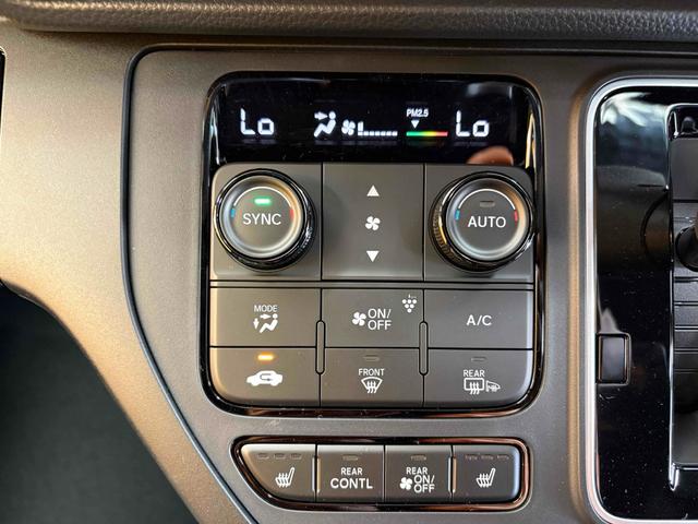 ステップワゴン スパーダ クリアランスソナー オートクルーズコントロール レーンアシスト 両側電動スライドドア オートライト 電動リアゲート スマートキー 電動格納ミラー シートヒーター 3列シート ウォークスルー オットマン(64枚目)