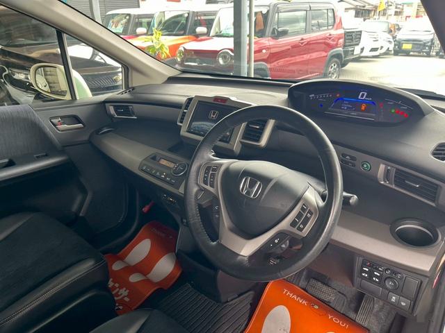 フリードハイブリッド ジャストセレクション　１年保証　両側電動スライドドア　ナビ　ＴＶ　バックモニター　ＥＴＣ　純正マット　スマートキー　クルーズコントロール（21枚目）