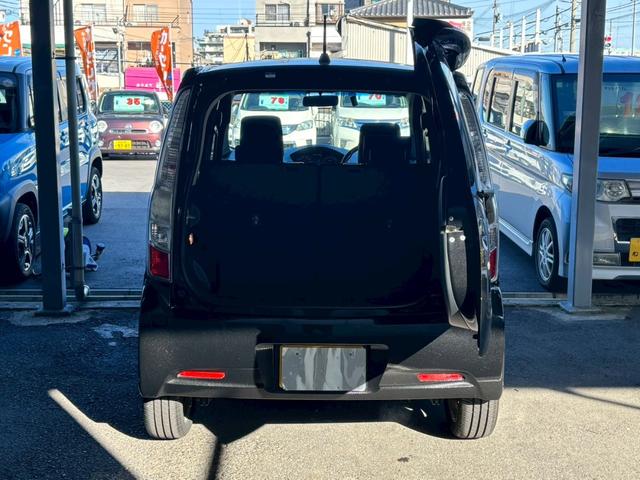 ムーヴ カスタム　ＲＳ　１年保証　社外ナビ　フルセグＴＶ　ＥＴＣ　純正１６インチアルミホイール　プッシュスタート　運転席シートリフター　プライバシーガラス　オートヘッドライト　ＭＯＭＯ製革巻きステアリング（11枚目）