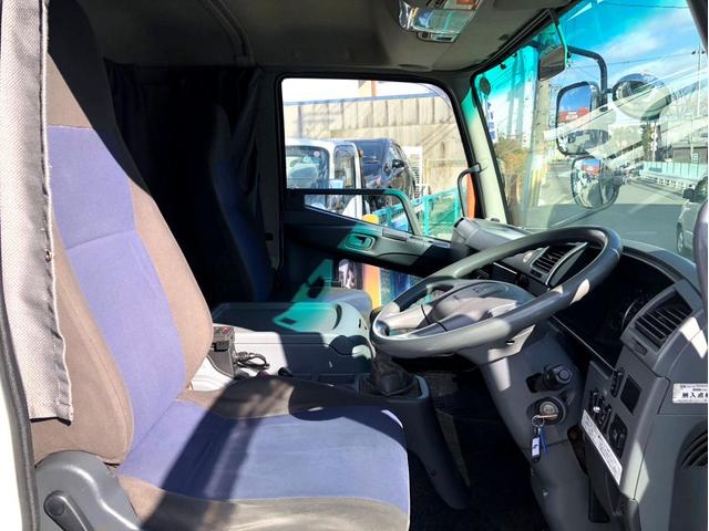 ファイター 　平ボディ　増トンタダノ　５段クレーン　フックイン　２．９３ｔ吊　ラジコン付　後輪エアサス　アルミブロック　リターダ付　２７０馬力　バックモニター　ベッド付　アドブルー　荷台内寸：５５９　２２２／ｃｍ（33枚目）