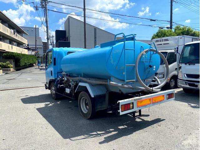 エルフトラック 　平成２１年　いすゞエルフ　散水車極東開発　ＬＨ０４－３０１Ｒ　容量　４０００Ｌ１５０馬力スペアタイヤ（31枚目）