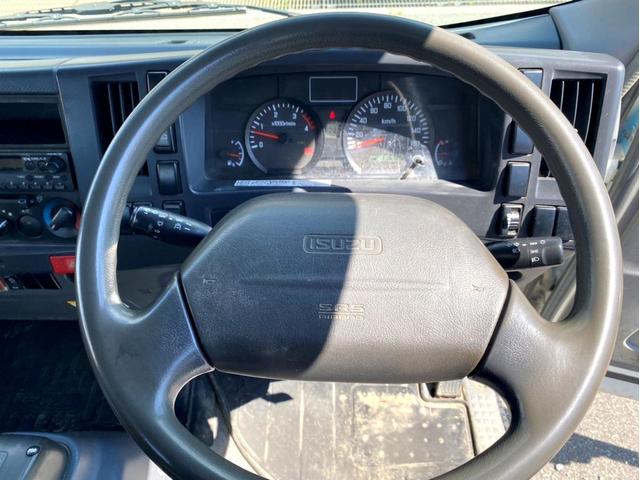 エルフトラック 　平成２１年　いすゞエルフ　散水車極東開発　ＬＨ０４－３０１Ｒ　容量　４０００Ｌ１５０馬力スペアタイヤ（50枚目）