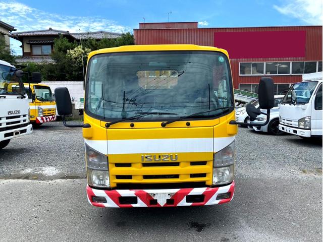 エルフトラック 　平成２１年　いすゞエルフ　平ボディ標準幅　ロング荷台内寸　：　４３６　１８０／ｃｍ　積載量　：　２０００ｋｇ準中型５ｔ未満坂道アシストＤＰＤＥＴＣスペアタイヤ（5枚目）