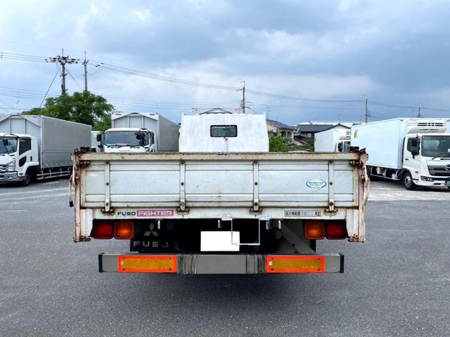 ファイター 　平成１７年　三菱ふそうファイター　平ボディ荷台鉄板荷台内寸　：　５７６　２１５／ｃｍ　積載量　：　３８５０ｋｇ２１０馬力スペアタイヤ（6枚目）