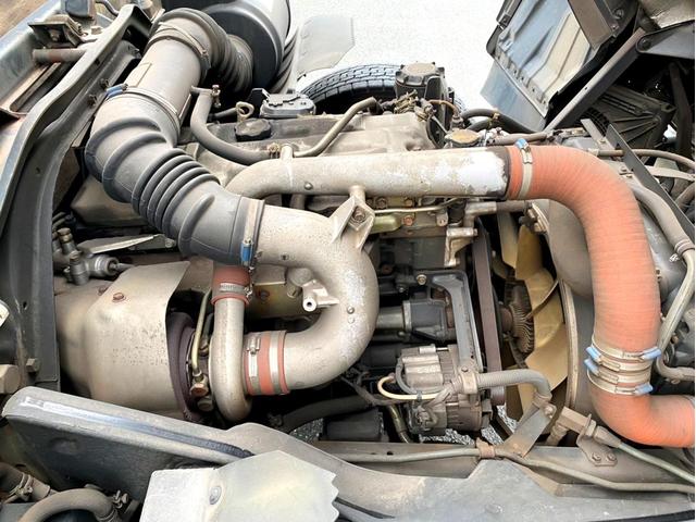 ファイター 　平成１７年　三菱ふそうファイター　平ボディ荷台鉄板荷台内寸　：　５７６　２１５／ｃｍ　積載量　：　３８５０ｋｇ２１０馬力スペアタイヤ（25枚目）