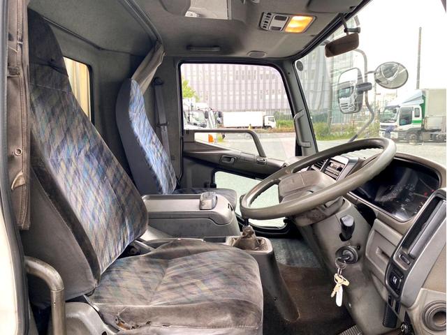 ファイター 　平成１７年　三菱ふそうファイター　平ボディ荷台鉄板荷台内寸　：　５７６　２１５／ｃｍ　積載量　：　３８５０ｋｇ２１０馬力スペアタイヤ（29枚目）