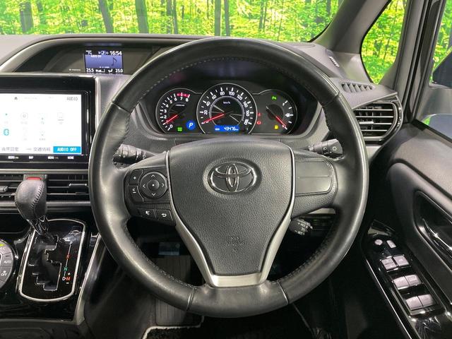 ヴォクシー ＺＳ　煌ＩＩＩ　両側電動ドア　純正ＳＤナビ　後席モニター　バックカメラ　衝突被害軽減システム　禁煙車　ハーフレザーシート　コーナーセンサー　スマートキー　ＬＥＤヘッド　ビルトインＥＴＣ　クルコン（11枚目）