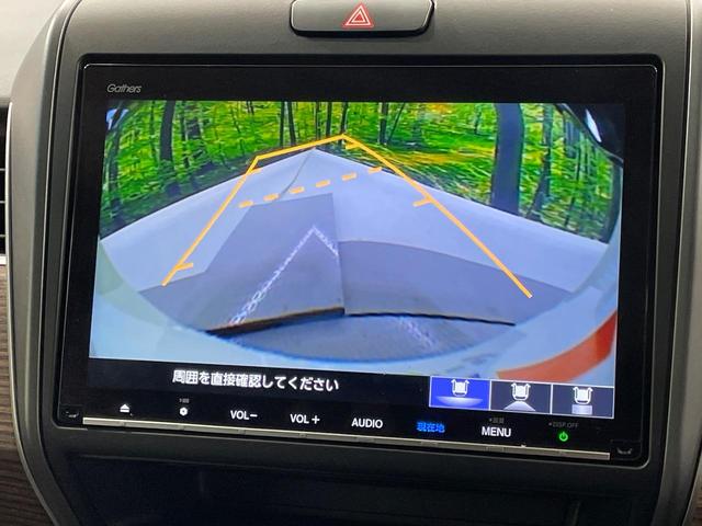 フリード クロスター・ホンダセンシング　両側電動ドア　純正９インチナビ　バックカメラ　衝突被害軽減システム　レーダークルーズコントロール　禁煙車　ハーフレザーシート　スマートキー　ＬＥＤヘッド　ビルトインＥＴＣ　純正１５インチアルミホイール（5枚目）