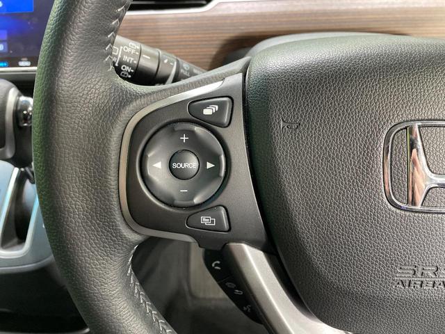 フリード クロスター・ホンダセンシング　両側電動ドア　純正９インチナビ　バックカメラ　衝突被害軽減システム　レーダークルーズコントロール　禁煙車　ハーフレザーシート　スマートキー　ＬＥＤヘッド　ビルトインＥＴＣ　純正１５インチアルミホイール（33枚目）