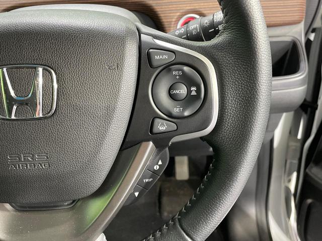 フリード クロスター・ホンダセンシング　両側電動ドア　純正９インチナビ　バックカメラ　衝突被害軽減システム　レーダークルーズコントロール　禁煙車　ハーフレザーシート　スマートキー　ＬＥＤヘッド　ビルトインＥＴＣ　純正１５インチアルミホイール（34枚目）