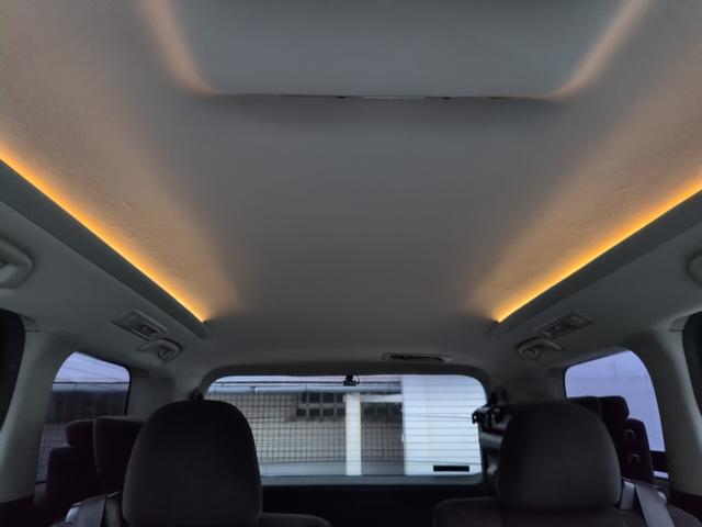 ヴェルファイア ２．４Ｚ　プラチナセレクションＩＩ　両側自動　スマートキー　両側パワースライドドア　電動リアゲート　プッシュスタート　ＥＴＣ　オートエアコン　純正アルミ　フリップダウンモニター　カロッツェリアナビ　フルセグＴＶ　バックカメラ　オットマン　スマートキー（12枚目）