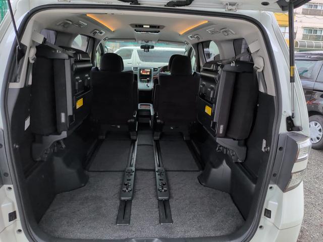 ヴェルファイア ２．４Ｚ　プラチナセレクションＩＩ　両側自動　スマートキー　両側パワースライドドア　電動リアゲート　プッシュスタート　ＥＴＣ　オートエアコン　純正アルミ　フリップダウンモニター　カロッツェリアナビ　フルセグＴＶ　バックカメラ　オットマン　スマートキー（22枚目）