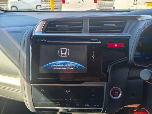 フィットハイブリッド Ｌパッケージ　お客様直接買取車両　純正ナビＴＶ　Ｂｌｕｅｔｏｏｔｈ　ＣＤ　ＤＶＤ　電格ミラー　スマートキー×２　プッシュスタート　ＥＴＣ　バックカメラ　オートライト　１５００ｃｃ（12枚目）