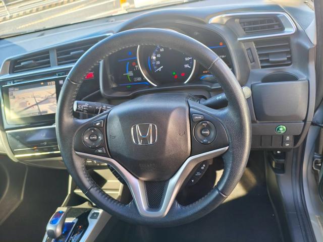フィットハイブリッド Ｌパッケージ　お客様直接買取車両　純正ナビＴＶ　Ｂｌｕｅｔｏｏｔｈ　ＣＤ　ＤＶＤ　電格ミラー　スマートキー×２　プッシュスタート　ＥＴＣ　バックカメラ　オートライト　１５００ｃｃ（16枚目）