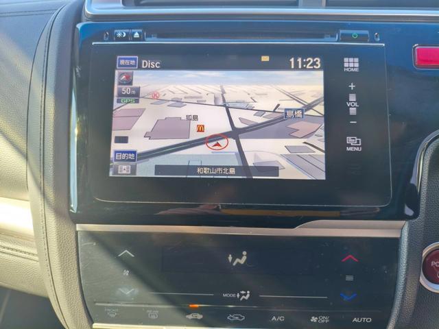 フィットハイブリッド Ｌパッケージ　お客様直接買取車両　純正ナビＴＶ　Ｂｌｕｅｔｏｏｔｈ　ＣＤ　ＤＶＤ　電格ミラー　スマートキー×２　プッシュスタート　ＥＴＣ　バックカメラ　オートライト　１５００ｃｃ（21枚目）