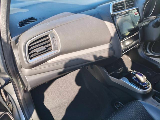 フィットハイブリッド Ｌパッケージ　お客様直接買取車両　純正ナビＴＶ　Ｂｌｕｅｔｏｏｔｈ　ＣＤ　ＤＶＤ　電格ミラー　スマートキー×２　プッシュスタート　ＥＴＣ　バックカメラ　オートライト　１５００ｃｃ（31枚目）