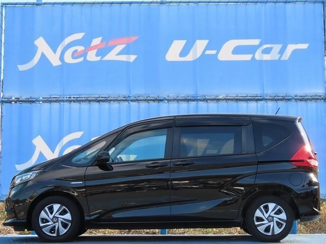 フリードハイブリッド ハイブリッド・Gホンダセンシング 軽減ブレーキ キーフリーシステム 記録簿 メモリーナビ 後カメラ Aクルーズ 地デジフルセグTV LEDヘッドランプ 横滑防止 パワーウインドウ ETC付 両席エアバック エアバッグ ナビTV ABS(5枚目)