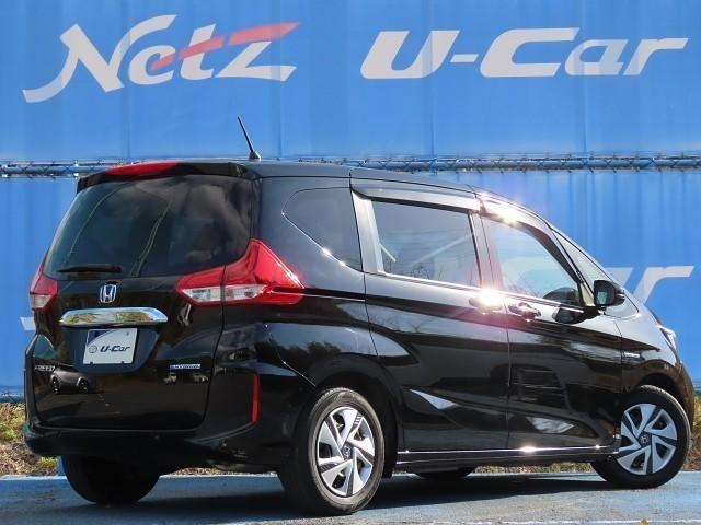 フリードハイブリッド ハイブリッド・Gホンダセンシング 軽減ブレーキ キーフリーシステム 記録簿 メモリーナビ 後カメラ Aクルーズ 地デジフルセグTV LEDヘッドランプ 横滑防止 パワーウインドウ ETC付 両席エアバック エアバッグ ナビTV ABS(6枚目)