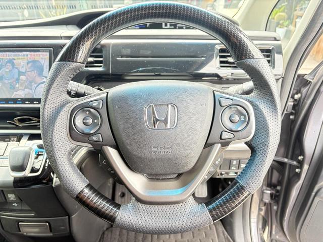 ステップワゴンスパーダ スパーダハイブリッド　Ｇ・ＥＸ　ホンダセンシング　ブラックスタイル仕様　エンブレム・モールブラック塗装　キャリパー塗装　フリップダウンモニター　ローダウン　ＢＢＳ製１８インチアルミホイール　３６０°カメラ　ドラレコ　ＥＴＣ（15枚目）