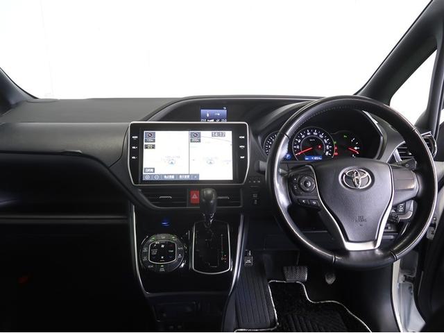 ヴォクシー ZS 煌II スマートキー・プッシュスタート バックガイドモニター セキュリティアラーム 両側パワスラドア 1オーナー ETC車載器 地デジテレビ VSC LEDライト 助手席エアバック キーレスエントリー AC(7枚目)