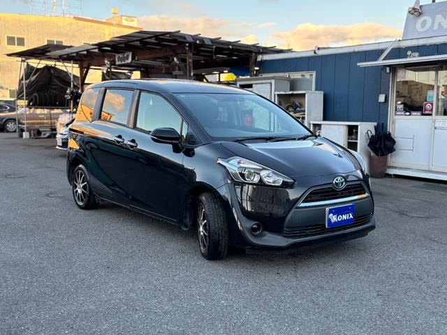 シエンタ ハイブリッドX 純正ナビ バックカメラ TV Bluetoothオーディオ スマートキー2コ 電動スライドドア ETC オートエアコン 社外アルミ 7人乗り(3枚目)