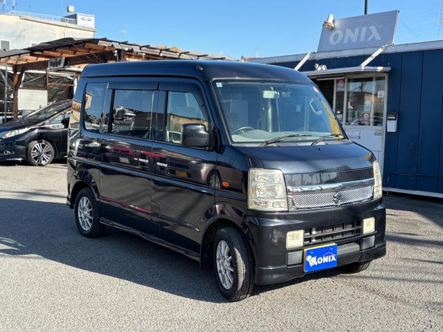 エブリイワゴン ＰＺターボスペシャル　ハイルーフ　両側電動スライドドア　オートステップ　ターボ車　キーレス　社外ナビ　フルセグＴＶ　Ｂｌｕｅｔｏｏｔｈオーディオ　ＨＩＤ　ＥＴＣ　社外アルミ　オートエアコン　ドラレコ（3枚目）