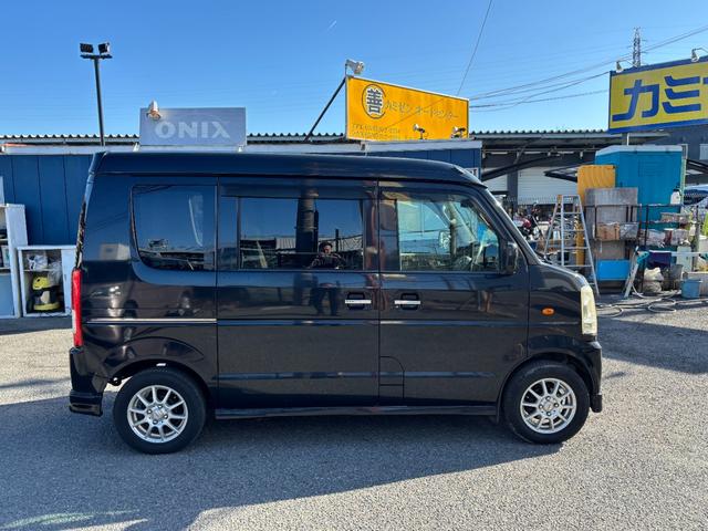 エブリイワゴン ＰＺターボスペシャル　ハイルーフ　両側電動スライドドア　オートステップ　ターボ車　キーレス　社外ナビ　フルセグＴＶ　Ｂｌｕｅｔｏｏｔｈオーディオ　ＨＩＤ　ＥＴＣ　社外アルミ　オートエアコン　ドラレコ（8枚目）