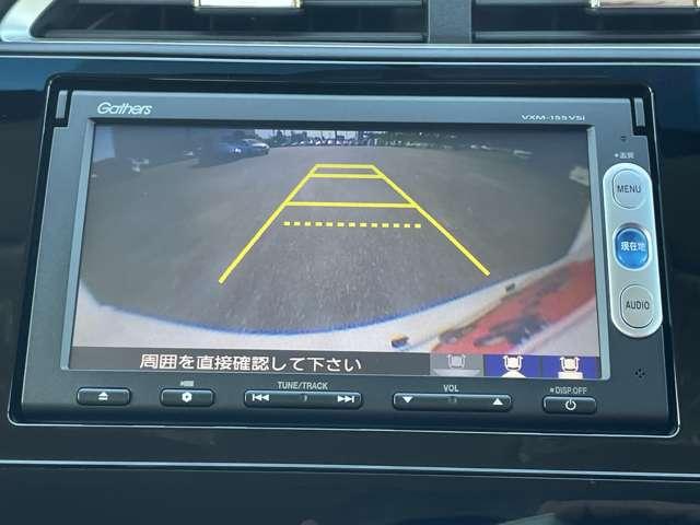 シャトル ハイブリッド　禁煙車／ギャザーズメモリーナビ／フルセグＴＶ／Ｂｌｕｅｔｏｏｔｈ対応／ＤＶＤ再生／バックカメラ／スマートキー／モデューロ１５インチアルミ／純正エアロパーツ／ＥＴＣ／ウィンカーミラー／横滑り防止装置／（7枚目）