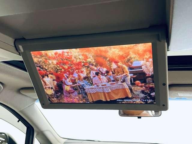 エルグランド 250ハイウェイスターSジェットブラックアバンクロム 禁煙車/ツインサンルーフ/アラウンドビューモニター/フルセグ付純正HDDナビ/DVD再生可/純正フリップタウンモニター/両側電動スライドドア/純正エアロパーツ/パワーシート/ETC/(9枚目)