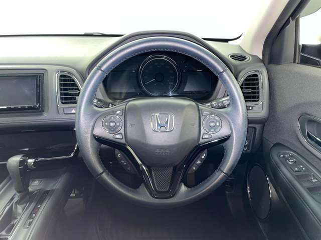 ヴェゼル Ｘ・ホンダセンシング　禁煙車／ホンダセンシング／アダブティブクルーズコントロール／ワンセグ付ケンウッドナビ／走行中ＴＶ／ＤＶＤ視聴可／バックカメラ／ＬＥＤヘッドライト／アイドリングストップ／純正ＡＷ／革巻ステアリング／（16枚目）