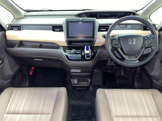 フリードハイブリッド ハイブリッド・Gホンダセンシング フルセグ付ギャザーズ9インチインターナビ!DVD再生可!BLUETOOTH!バック&フロントモニター!ホンダセンシング!両側パワスラ!LEDヘッドランプ!ウインカーミラー!(6枚目)