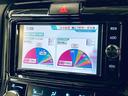 カローラフィールダー ハイブリッドＧ　ダブルバイビー　禁煙車！衝突被害軽減ブレーキ！クルーズコントロール！純正ナビ！バックカメラ！ＢＴ！フルセグＴＶ！ＥＴＣ！シートヒーター！スマートキー！キーレス！アイドリングストップ！ＴＲＤエアロ！ＴＲＤ１６ＡＷ！（7枚目）