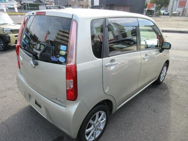 ムーヴ Ｘリミテッド　衝突安全ボディ　スマートキー　純正ワンセグＴＶナビ　バックカメラ　シャンパンゴールドメタリック　ハロゲンヘッドライト　アイドリングストップ　純正１４インチアルミホイール　ＡＢＳ　２ＷＤ　６６０（4枚目）