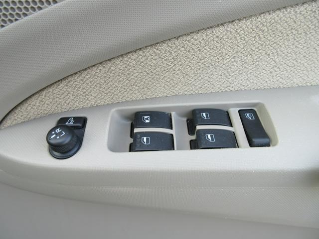 ムーヴ Ｘリミテッド　衝突安全ボディ　スマートキー　純正ワンセグＴＶナビ　バックカメラ　シャンパンゴールドメタリック　ハロゲンヘッドライト　アイドリングストップ　純正１４インチアルミホイール　ＡＢＳ　２ＷＤ　６６０（19枚目）