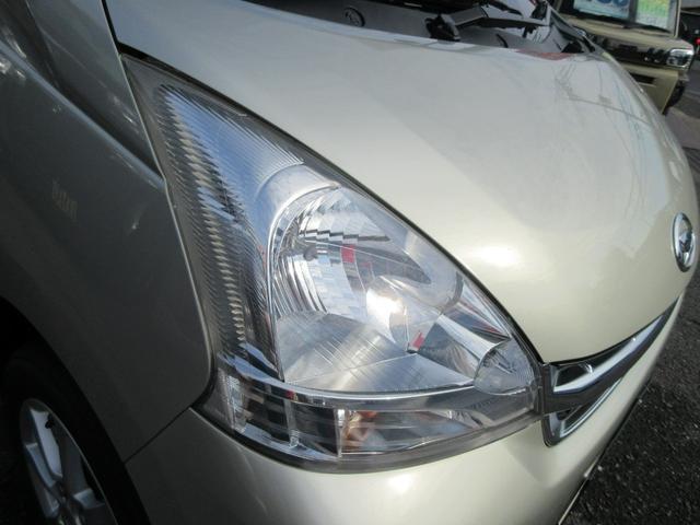 ムーヴ Ｘリミテッド　衝突安全ボディ　スマートキー　純正ワンセグＴＶナビ　バックカメラ　シャンパンゴールドメタリック　ハロゲンヘッドライト　アイドリングストップ　純正１４インチアルミホイール　ＡＢＳ　２ＷＤ　６６０（34枚目）