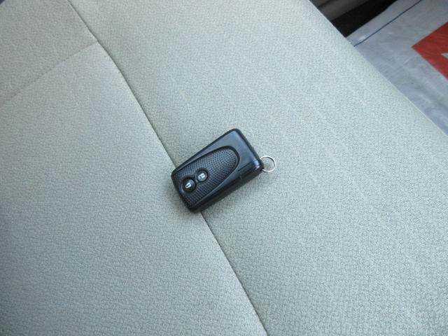 ムーヴ Xリミテッド 衝突安全ボディ アイドリングストップ ハロゲンヘッドライト オートエアコン スマートキー 純正ワンセグTVナビ バックカメラ 純正14インチアルミホイール パールホワイト ベンチシート 2WD 660(29枚目)