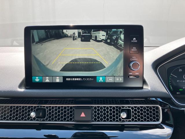 シビック ｅ：ＨＥＶ　ＨｏｎｄａＣＯＮＮＥＣＴディスプレーＡＣＣブラインドスポットインフォメーションＬＥＤヘッドフォグＥＴＣ前後ドラレコ運転席助手席パワーシートエレクトリックギアセレクター純正アルミパーキングセンサー（15枚目）