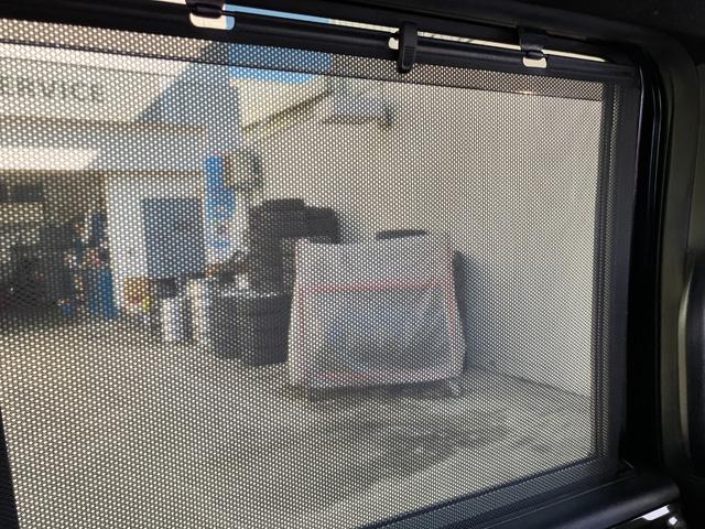 N-BOXカスタム G・Lターボホンダセンシング ACC社外フルセグナビLEDヘッドフォグRカメラETCサイドカーテンエアバッグ両側パワスラ純正アルミBTブルーレイ再生パドルシフト本革巻きステアリングスマキー(11枚目)