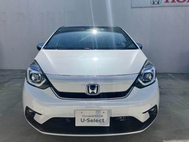 フィット e:HEVリュクス ACCフルセグナビLEDヘッドフォグRカメラETCナビ連動ドラレコ運転席助手席シートヒーター電制PパーキングセンサーオートブレーキホールドBTミュージックラックCDDVD再生ステアリングヒーター(3枚目)