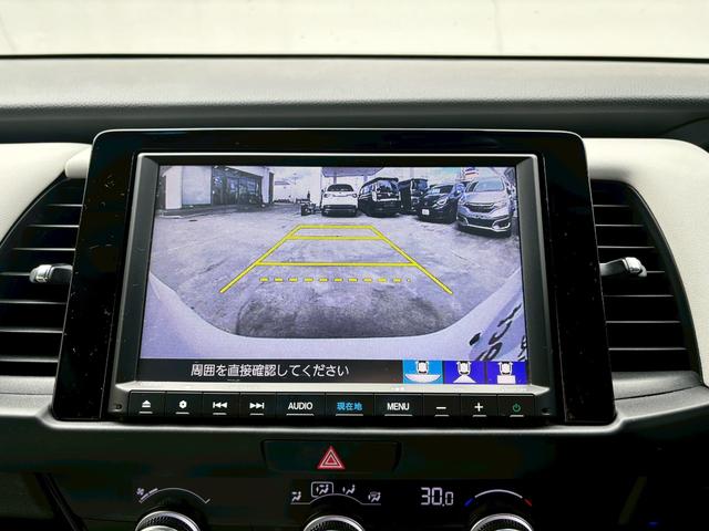 フィット ｅ：ＨＥＶホーム　ＡＣＣフルセグナビＬＥＤヘッドＲカメラＥＴＣサイドカーテンエアバッグ電制ＰオートブレーキホールドＢＴドラレコＵＳＢパーキングセンサ純正アルミ本革巻きステアリングＣＤＤＶＤ再生スマキー（14枚目）