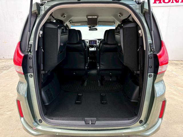 フリード G・ホンダセンシング ACCフルセグナビLEDヘッドRカメラETCドラレコ両側パワスラ運転席助手席シートヒーターリアモニターBTミュージックラックCDDVD再生オートリトラー純正アルミスマキー(9枚目)
