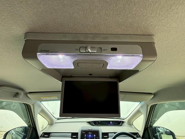 フリード G・ホンダセンシング ACCフルセグナビLEDヘッドRカメラETCドラレコ両側パワスラ運転席助手席シートヒーターリアモニターBTミュージックラックCDDVD再生オートリトラー純正アルミスマキー(11枚目)