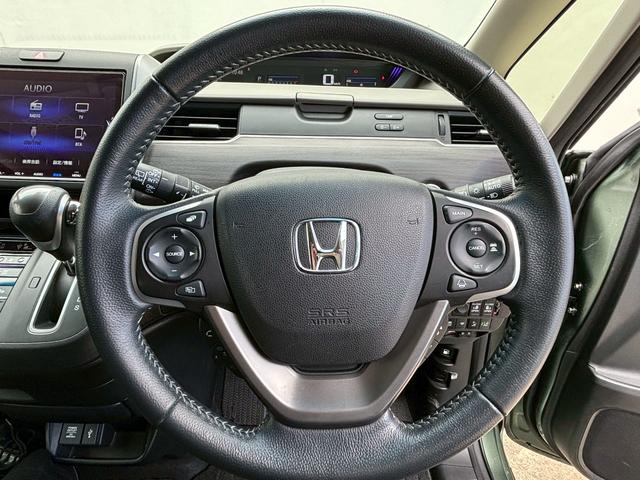 フリード G・ホンダセンシング ACCフルセグナビLEDヘッドRカメラETCドラレコ両側パワスラ運転席助手席シートヒーターリアモニターBTミュージックラックCDDVD再生オートリトラー純正アルミスマキー(19枚目)