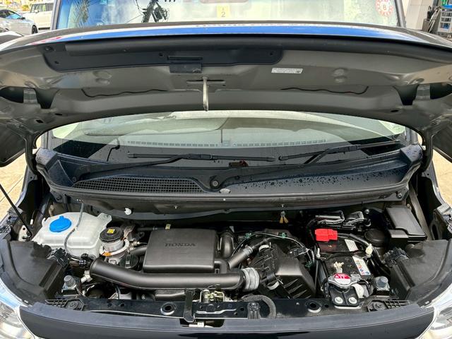 N-BOX L ACCフルセグナLEDヘッドRカメラETC左リアパワスラ電制Pオートブレーキホールド運転席助手席シートヒーターパーキングセンサーBTミュージックラックCDDVD再生USBシートバックテーブルスマキー(23枚目)