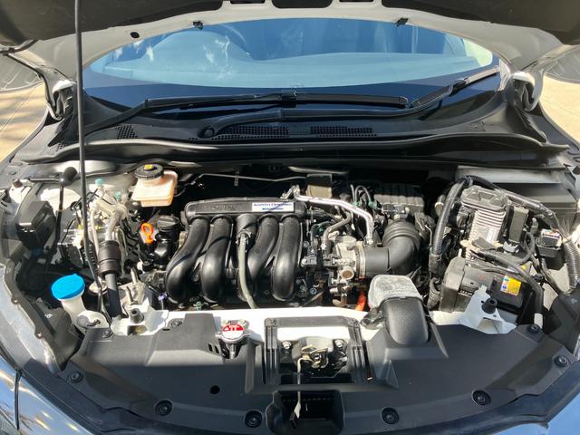 ヴェゼル ハイブリッドＺ　ＡＣＣフルセグナビＬＥＤヘッドＲカメラＥＴＣフォグランプ電制Ｐオートブレーキホールド機能サイドカーテンエアバッグ運転席助手席シートヒーターＢＴミュージックラックＣＤＤＶＤ再生ＵＳＢスマキー（28枚目）