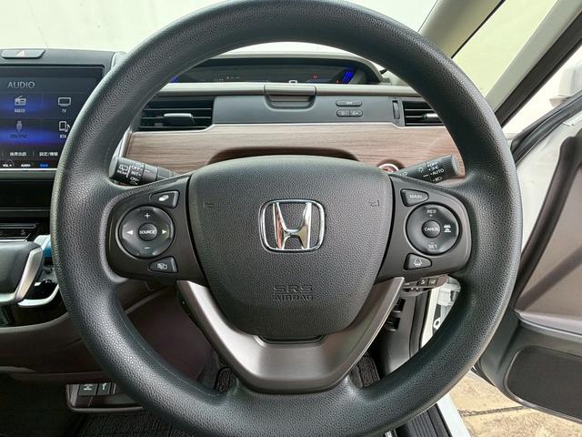 フリードハイブリッド ハイブリッド・Ｇホンダセンシング　ＡＣＣフルセグナビＬＥＤヘッドＲカメラ両側パワスラＥＴＣオートエアコンＢＴミュージックラックＣＤＤＶＤ再生ＵＳＢジャックオートリトラミラースマキー（18枚目）