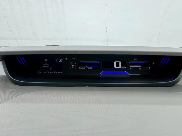 フリードハイブリッド ハイブリッド・Ｇホンダセンシング　ＡＣＣフルセグナビＬＥＤヘッドＲカメラ両側パワスラＥＴＣオートエアコンＢＴミュージックラックＣＤＤＶＤ再生ＵＳＢジャックオートリトラミラースマキー（21枚目）
