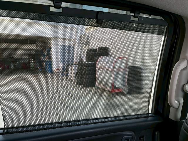 フリードハイブリッド ハイブリッド・Ｇホンダセンシング　ＡＣＣフルセグナビＬＥＤヘッドＲカメラＥＴＣサイドカーテンエアバッグＲモニター両側パワスラ運転席助手席シートヒーターＢＴミュージックラックＣＤＤＶＤ再生純正アルミ本革巻きステアリングスマキー（11枚目）