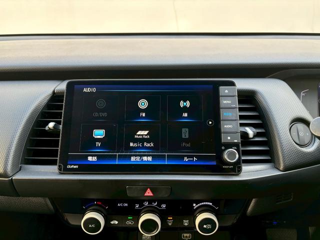 フィット ベーシック　ＡＣＣフルセグナビＥＴＣハロゲンヘッドＲカメラナビ連動前後ドラレコサイドカーテンエアバッグ電制ＰオートブレーキホールドＢＴミュージックラックＣＤＤＶＤ再生ＵＳＢスマキー（12枚目）